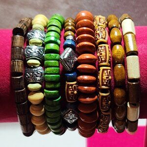 Awesome set of eight bracelets to mix match have fun wooden silver tone NIP